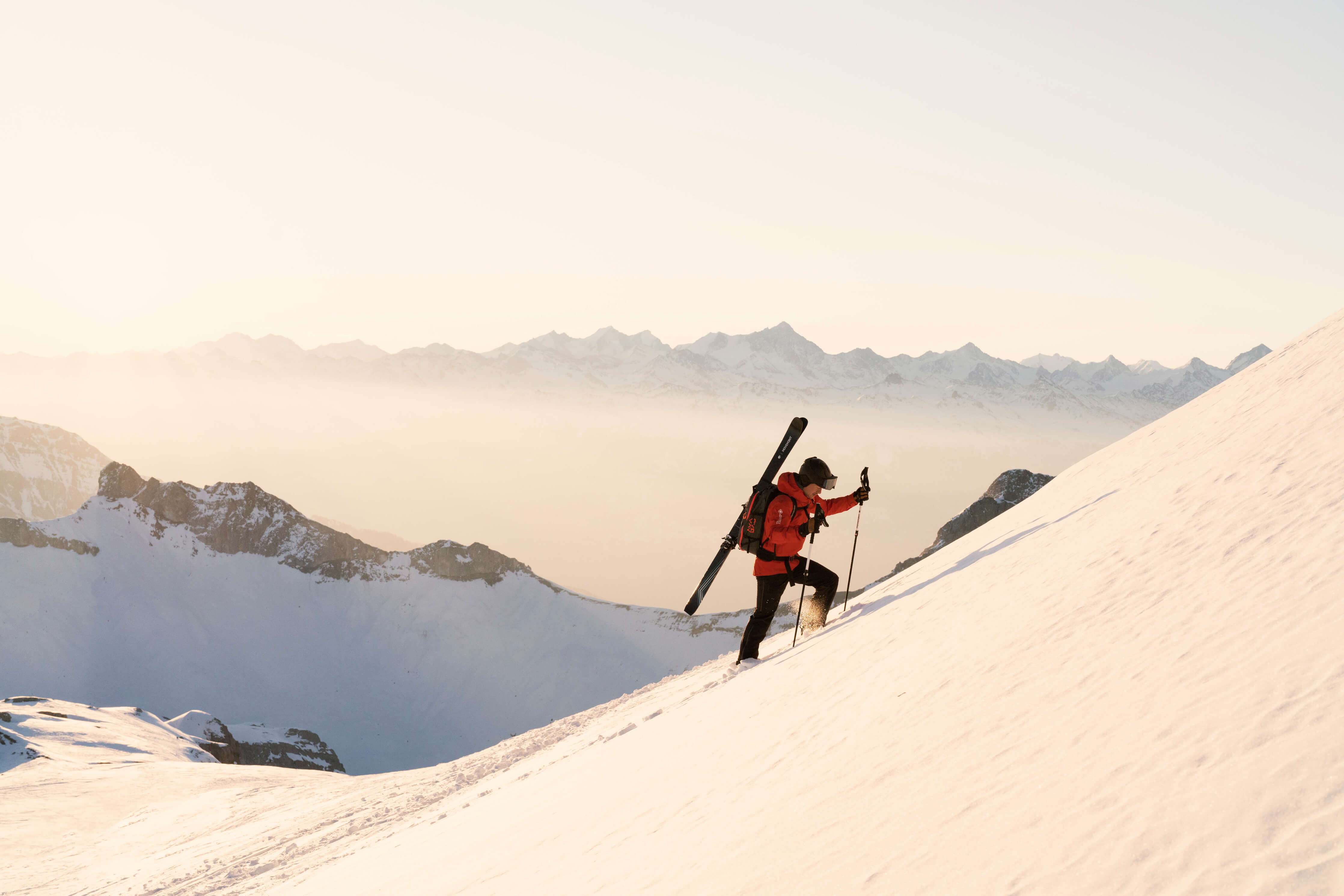 A touring skier climbing his next summit with the Movement Alp Tracks 95.