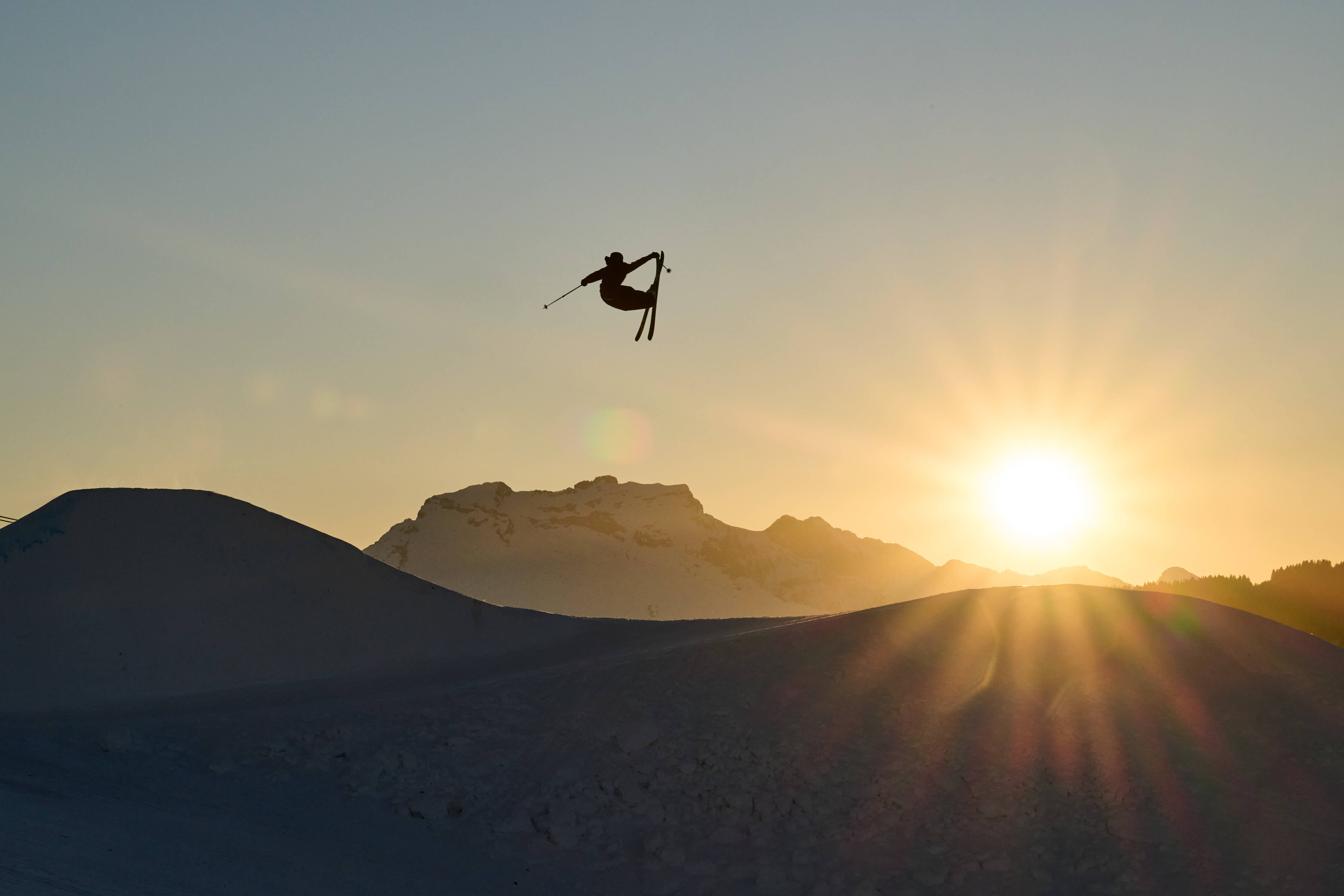 A Movement freestyle skier in La Clusaz for a sunset session.